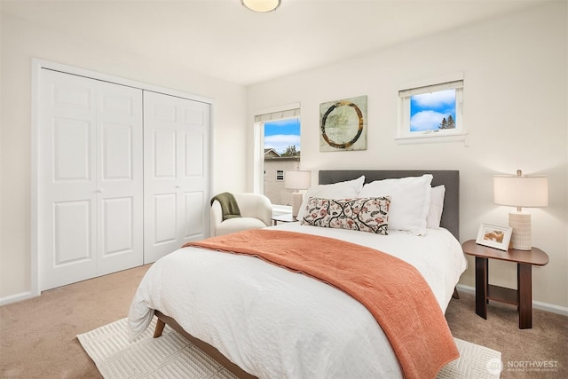 2101 N 55th St Unit 312, Seattle, WA 98103 - bedroom with light colored carpet and a closet