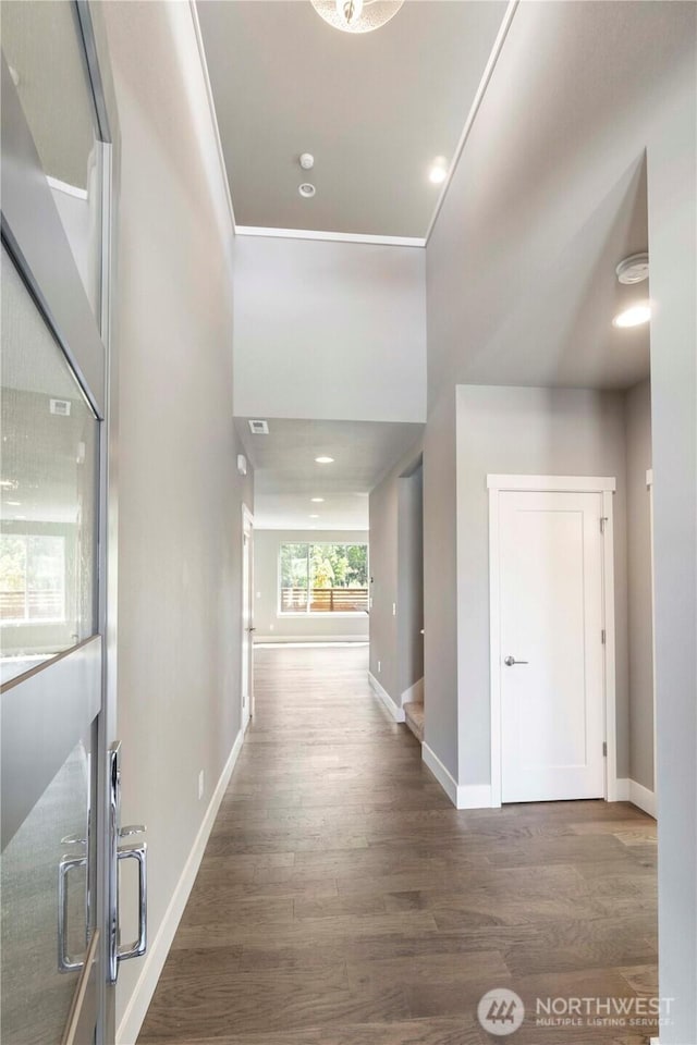 20837 156th St E, Bonney Lake, WA 98391 - hallway featuring wood finished floors and baseboards