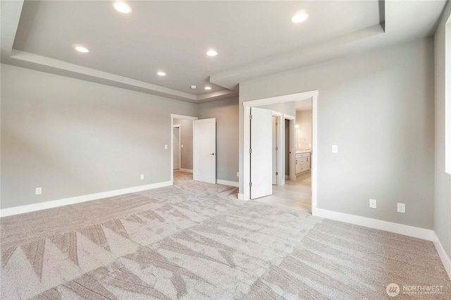 20837 156th St E, Bonney Lake, WA 98391 - unfurnished bedroom with light colored carpet, a tray ceiling, and recessed lighting