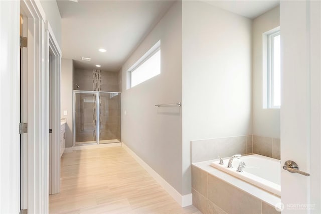 20837 156th St E, Bonney Lake, WA 98391 - bathroom with a shower stall, a bath, vanity, and wood finished floors