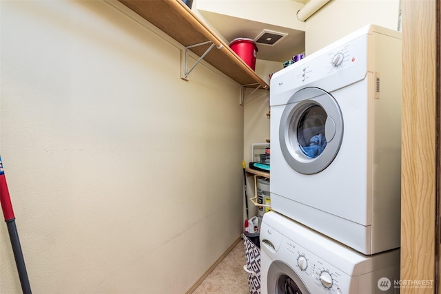 512 Darby Dr Unit 213, Bellingham, WA 98226 - laundry room with stacked washer / dryer