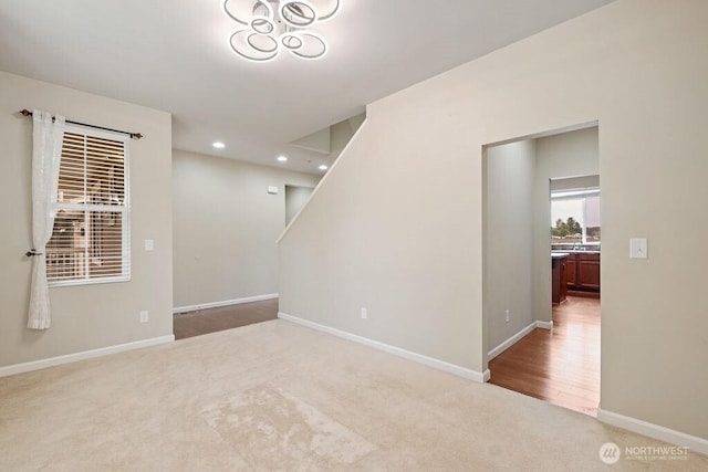 1353 32nd Pl NE, Auburn, WA 98002 - carpeted empty room featuring recessed lighting and stairs