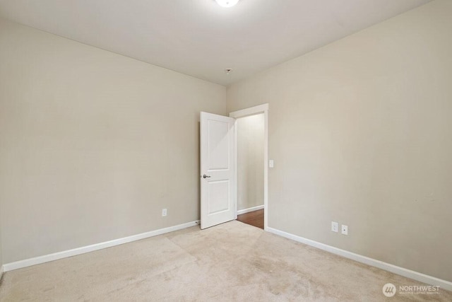 1353 32nd Pl NE, Auburn, WA 98002 - carpeted empty room featuring baseboards