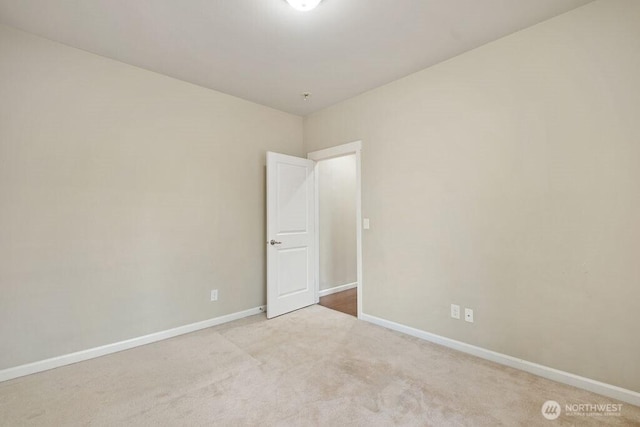 1353 32nd Pl NE, Auburn, WA 98002 - carpeted empty room with baseboards