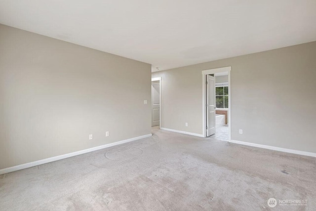 1353 32nd Pl NE, Auburn, WA 98002 - carpeted spare room with baseboards