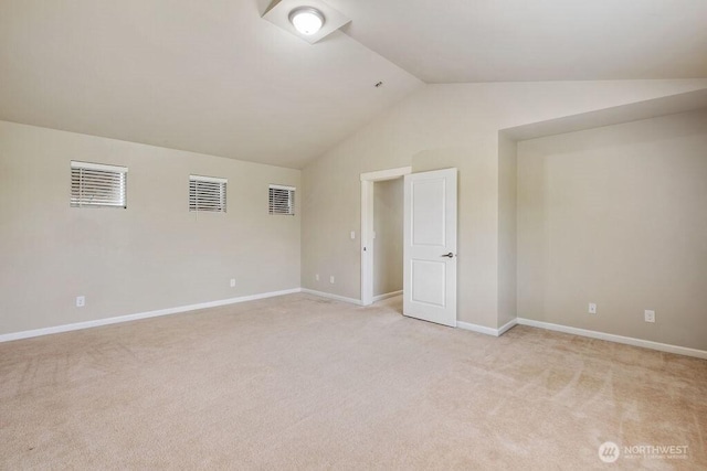 1353 32nd Pl NE, Auburn, WA 98002 - empty room with light colored carpet and lofted ceiling