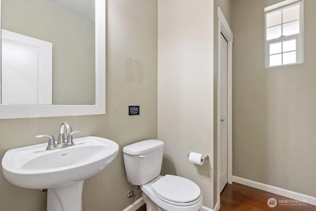 1353 32nd Pl NE, Auburn, WA 98002 - bathroom featuring toilet and wood finished floors