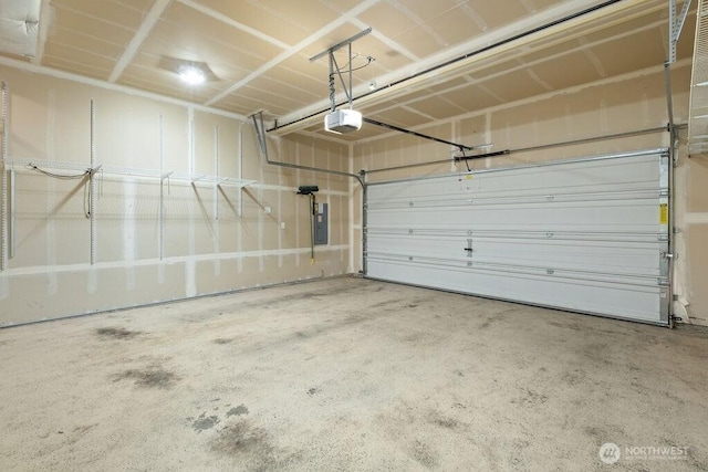 1353 32nd Pl NE, Auburn, WA 98002 - garage featuring a garage door opener and electric panel