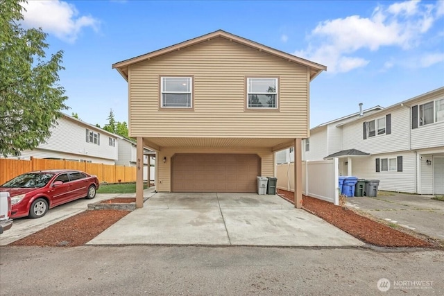 919 4th Ave N, Kent, WA 98032 - view of front of home featuring an attached garage and concrete driveway