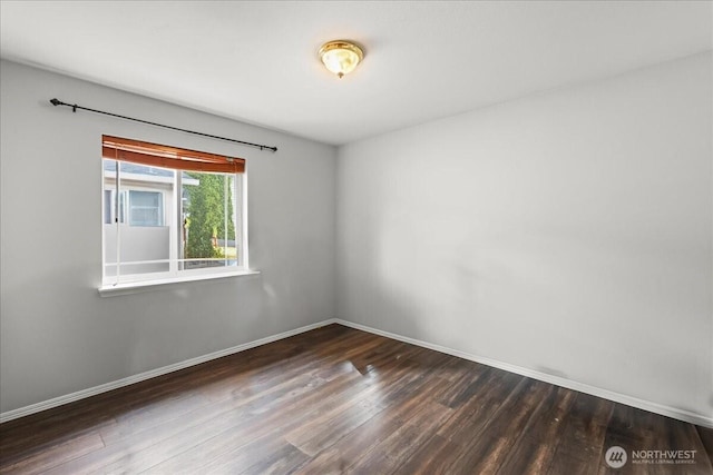 919 4th Ave N, Kent, WA 98032 - unfurnished room featuring dark wood-style floors and baseboards
