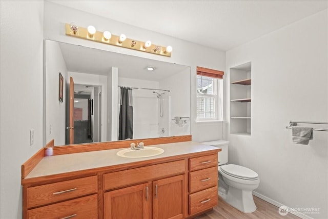 919 4th Ave N, Kent, WA 98032 - bathroom with vanity, a shower with curtain, and wood finished floors