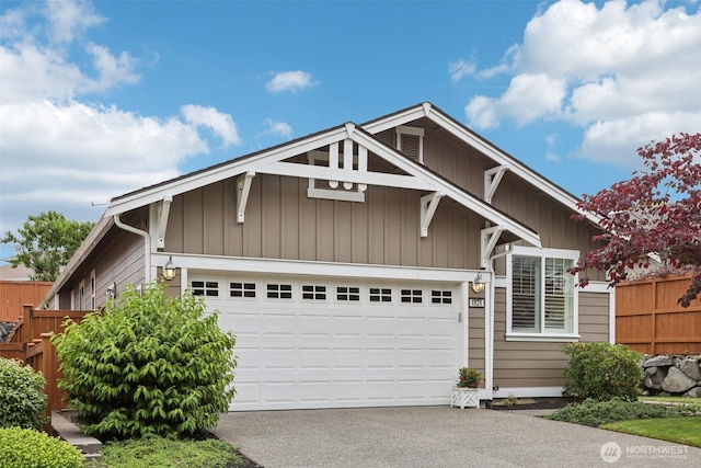4826 Bend Dr NE, Lacey, WA 98516 - view of front of home featuring driveway, board and batten siding, and a garage