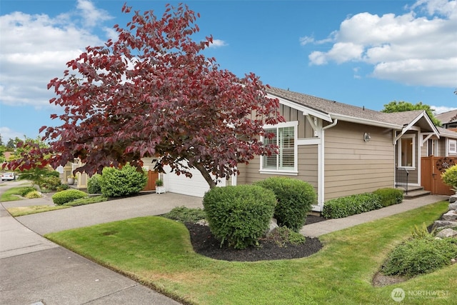 4826 Bend Dr NE, Lacey, WA 98516 - view of side of property featuring driveway and board and batten siding