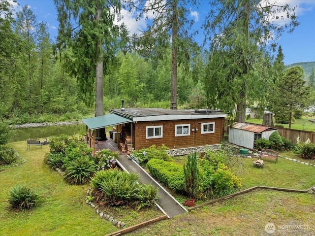 30710 223rd Ave NE, Arlington, WA 98223 - view of front facade with a storage shed and a porch