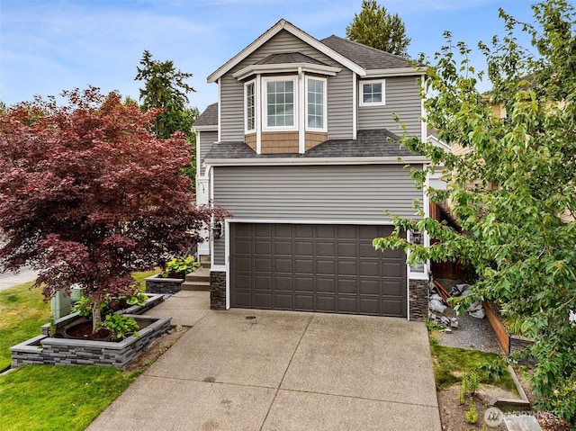 7726 162nd St E, Puyallup, WA 98375 - traditional-style house featuring an attached garage, a shingled roof, concrete driveway, and stone siding