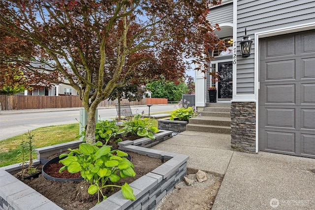 7726 162nd St E, Puyallup, WA 98375 - view of yard with a garage