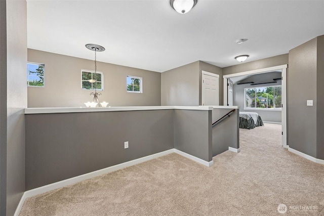7726 162nd St E, Puyallup, WA 98375 - hall featuring light carpet and an upstairs landing