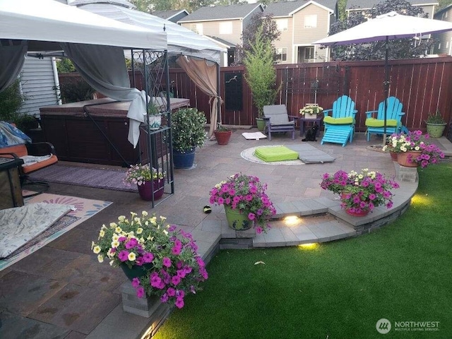 7726 162nd St E, Puyallup, WA 98375 - view of patio / terrace with a gazebo and a hot tub
