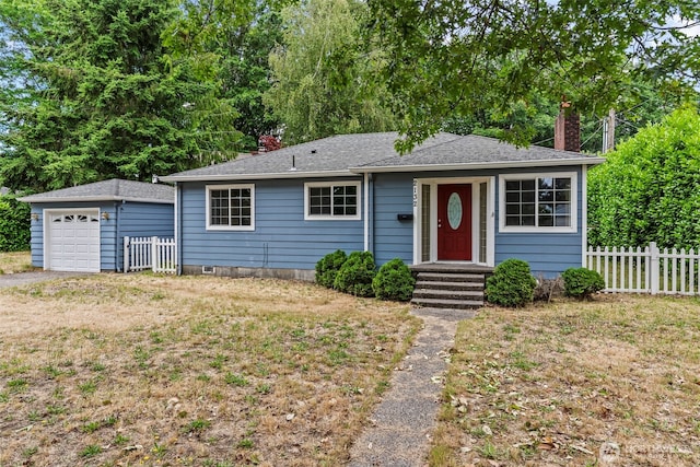 2132 Washington Way, Longview, WA 98632 - single story home with a chimney, an outbuilding, and a detached garage