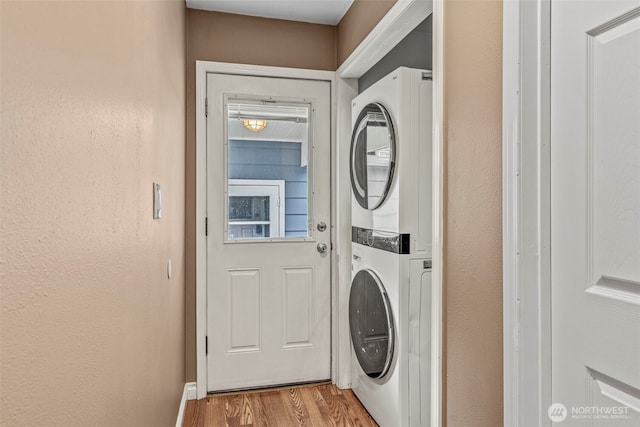 2132 Washington Way, Longview, WA 98632 - laundry area with stacked washer / dryer and light wood finished floors