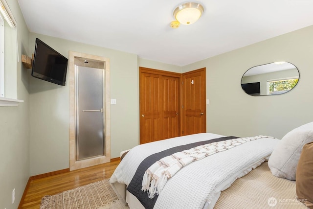132 NE 130th St, Seattle, WA 98125 - bedroom featuring a closet and light wood finished floors