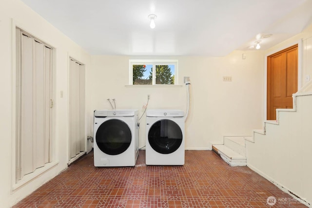 132 NE 130th St, Seattle, WA 98125 - washroom featuring separate washer and dryer and baseboards