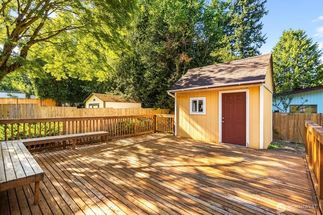 132 NE 130th St, Seattle, WA 98125 - wooden deck with a shed and a fenced backyard