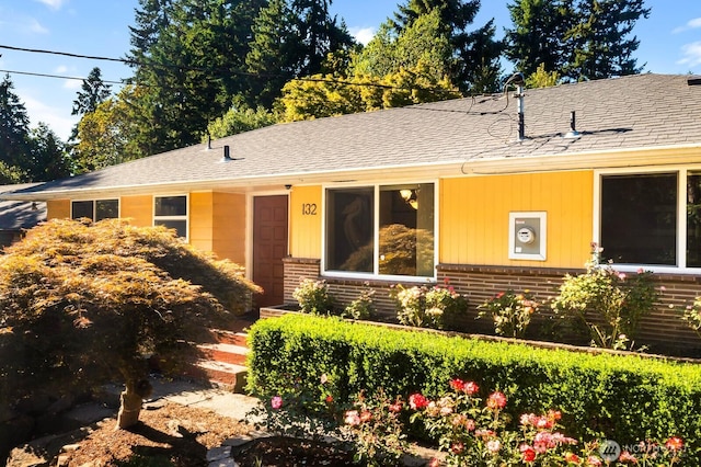 132 NE 130th St, Seattle, WA 98125 - view of front of home featuring brick siding and a shingled roof