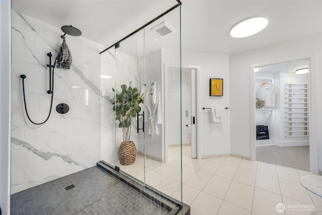 2033 2nd Ave Unit 1111, Seattle, WA 98121 - full bath with a marble finish shower and a walk in closet