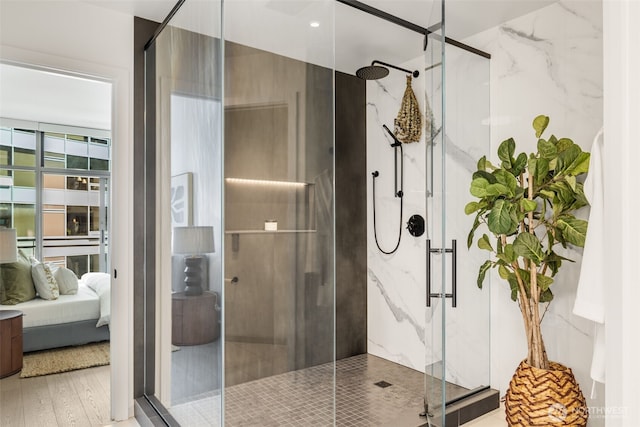 2033 2nd Ave Unit 1111, Seattle, WA 98121 - ensuite bathroom featuring a marble finish shower