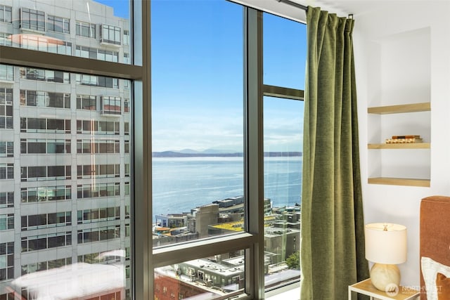 2033 2nd Ave Unit 1111, Seattle, WA 98121 - water view featuring a mountain backdrop