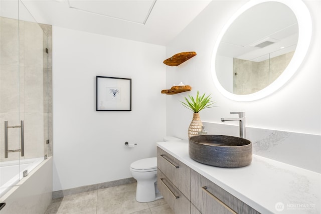 2033 2nd Ave Unit 1111, Seattle, WA 98121 - full bath with tile patterned flooring, vanity, and bath / shower combo with glass door