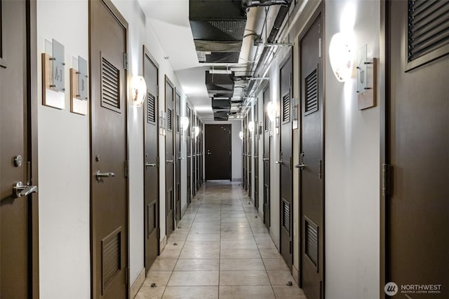 2033 2nd Ave Unit 1111, Seattle, WA 98121 - hallway featuring light tile patterned floors