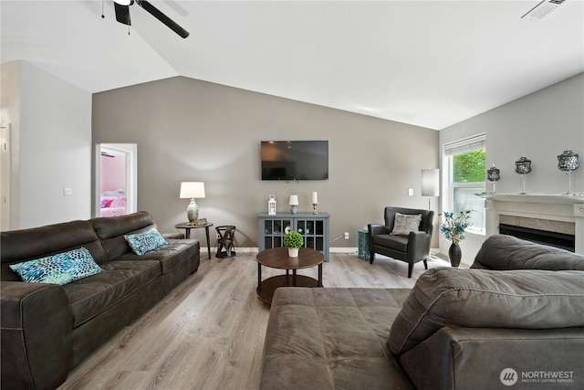 2322 Garrison St, Walla Walla, WA 99362 - living area featuring a ceiling fan, light wood-style floors, lofted ceiling, and a fireplace