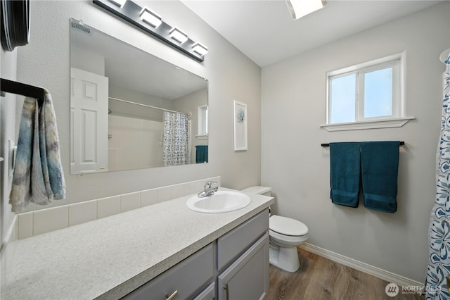 2322 Garrison St, Walla Walla, WA 99362 - full bath featuring vanity, wood finished floors, and a shower with curtain