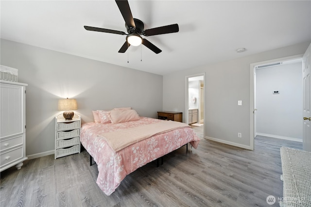 2322 Garrison St, Walla Walla, WA 99362 - bedroom featuring wood finished floors, a ceiling fan, and ensuite bath