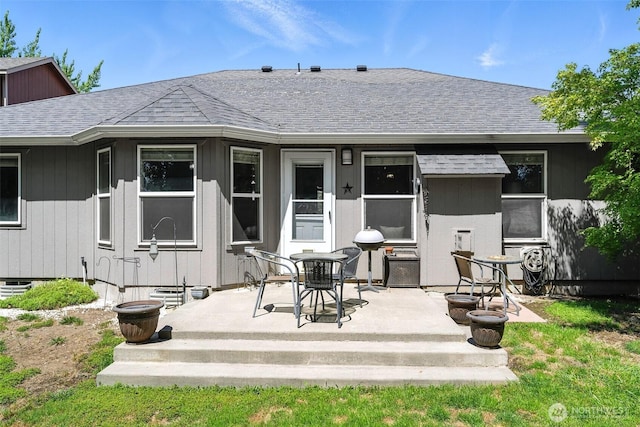2322 Garrison St, Walla Walla, WA 99362 - back of property featuring a shingled roof and a patio
