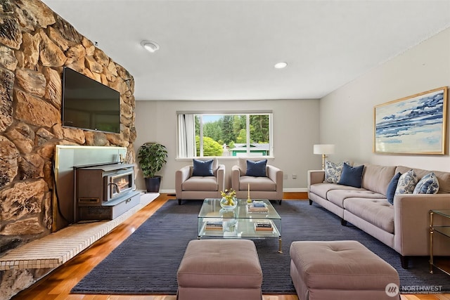 7523 13th Ave SE, Lacey, WA 98503 - living room with wood finished floors and a wood stove