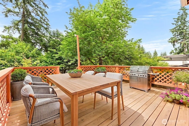 7523 13th Ave SE, Lacey, WA 98503 - deck with outdoor dining space and a grill