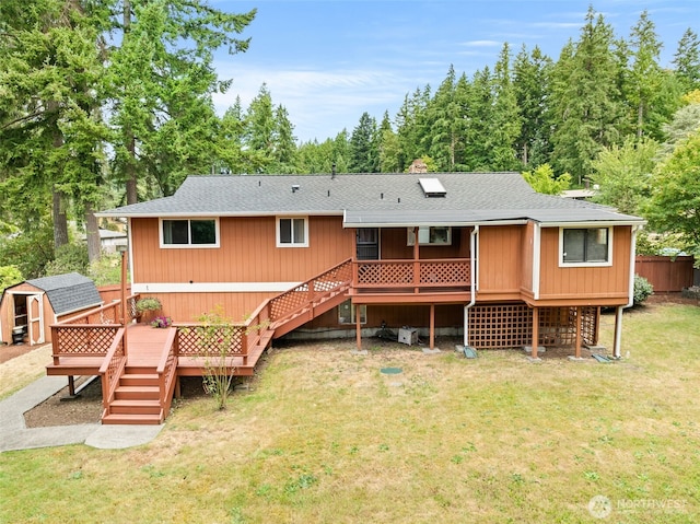 7523 13th Ave SE, Lacey, WA 98503 - rear view of house featuring stairway, a storage unit, a deck, and roof with shingles
