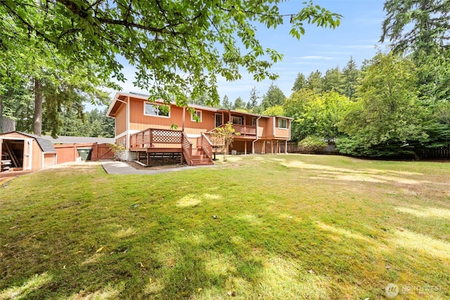 7523 13th Ave SE, Lacey, WA 98503 - back of house with a storage shed, a deck, and stairs