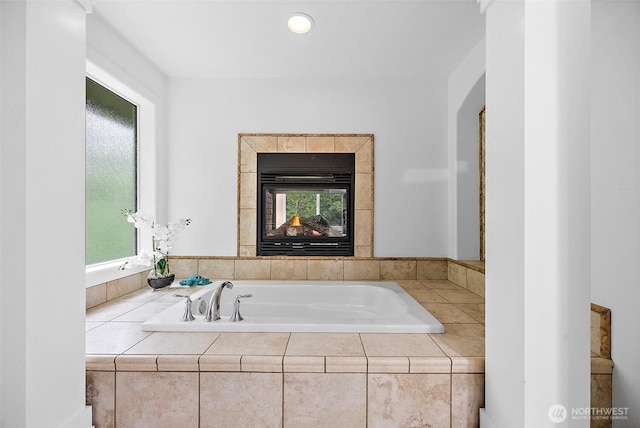 1402 180th Ave E, Lake Tapps, WA 98391 - bathroom featuring a bath and plenty of natural light