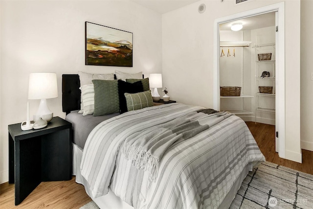 819 Virginia St Unit 1606, Seattle, WA 98101 - bedroom with wood finished floors