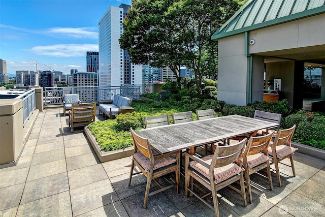 819 Virginia St Unit 1606, Seattle, WA 98101 - view of patio with a city view and outdoor dining area