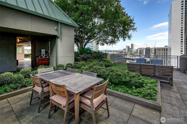 819 Virginia St Unit 1606, Seattle, WA 98101 - view of patio with outdoor dining space, an outdoor hangout area, and a city view