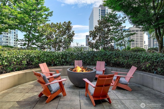 819 Virginia St Unit 1606, Seattle, WA 98101 - view of patio / terrace featuring a fire pit