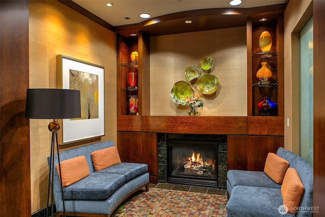 819 Virginia St Unit 1606, Seattle, WA 98101 - sitting room with built in shelves, recessed lighting, and a tile fireplace
