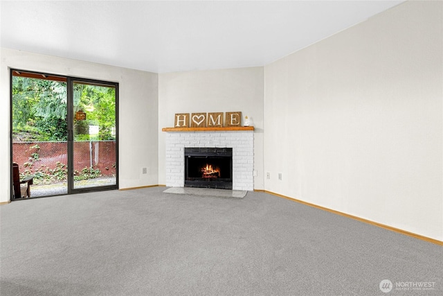 17521 118th Ave SE Unit A-4, Renton, WA 98058 - unfurnished living room featuring carpet and a brick fireplace