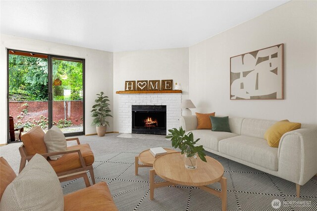 17521 118th Ave SE Unit A-4, Renton, WA 98058 - carpeted living room with a brick fireplace