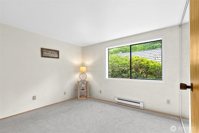 17521 118th Ave SE Unit A-4, Renton, WA 98058 - spare room featuring a baseboard heating unit and carpet floors